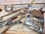 a lot of tools that are sitting on a table