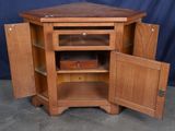 a wooden cabinet with a drawer inside of it