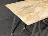 an image of a table with a marble top and metal legs