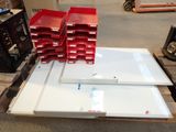 a lot of red boxes stacked on top of a pallet