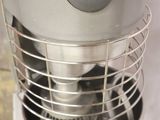 an image of a mixer with a basket on top of it