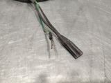 two wires that are connected to each other on a table
