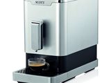a close up of a coffee machine on a white surface