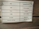 a picture of a sign on the side of a wooden bench