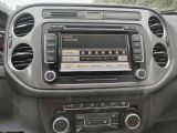 a radio in the center of a car that is on the dashboard