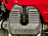 a close up of the engine of a red motorcycle