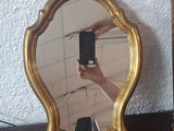 a person taking a picture of themselves in a mirror