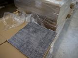 a pile of boxes that have been wrapped in plastic