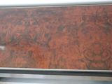 a close up of a wooden table with a metal base