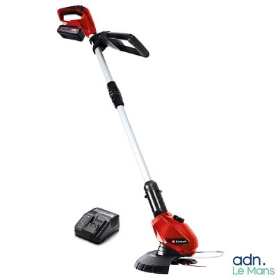 a red corded string trimmer with a battery and cord