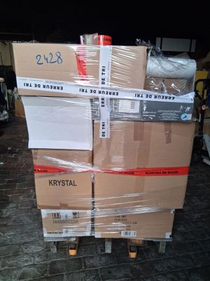 many boxes stacked on top of each other on a pallet