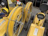 many different types of hoses and other equipment in a warehouse