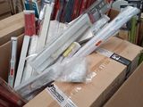 a box full of books and other items in a store