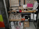 a large open cabinet with many items in it