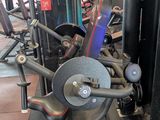 a row of machines in a gym with no people in it
