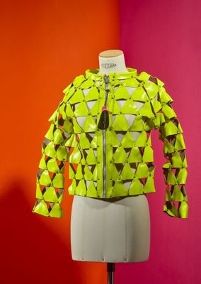 a yellow jacket on a mannequin mannequin on a mannequin mannequin