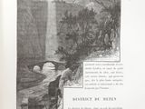 an open book with a picture of a waterfall in the background