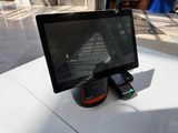 a tablet computer sitting on top of a table