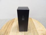 a black box sitting on top of a wooden table