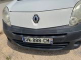 a picture of a white car parked on the side of the road