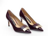 a close up of a pair of shoes on a white surface