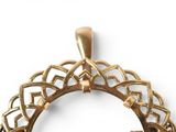 a gold pendant with a celtic design on it