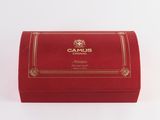 a red box with a gold trim and a name on it