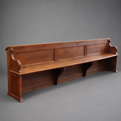 an image of a wooden bench on a gray background