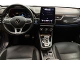 a picture of the interior of a car with a touch screen