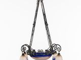 a blue and white chandelier hanging from a ceiling