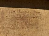 a close up of a piece of cloth with writing on it