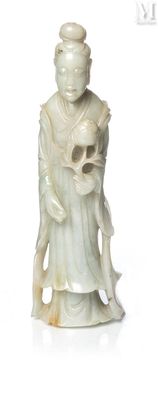 une image représentant une statue d'une femme tenant un crâne