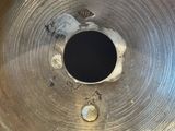 a close up of a metal object with a hole in it