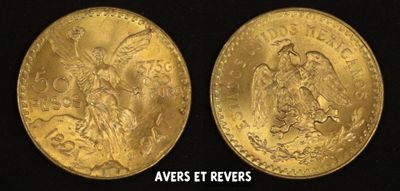 a close up of two gold coins on a black background