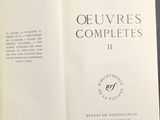 an open book with a picture of shakespeare ' s complete works