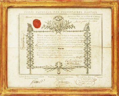 an old document with a red seal on it in a gold frame