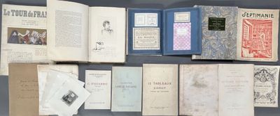 a lot of old books on a table together