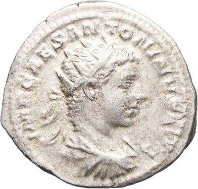une pièce d'argent portant une tête de femme