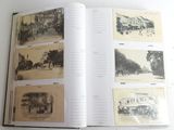 an open book with pictures of people and buildings on it