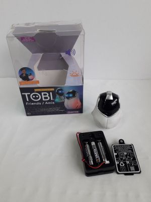 a box that has a camera and a remote control in it