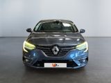 the front view of a grey car in a showroom