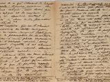 un gros plan d'un morceau de papier sur lequel on a écrit