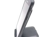 a cell phone that is sitting on top of a stand