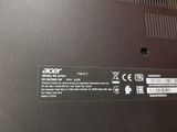 the back side of a laptop with a sticker on it