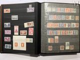 a black folder with stamps on it and a picture of a man