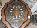 a clock that is sitting on a table in a room