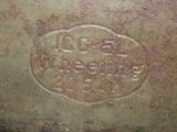 a close up of a bronze vase with a small inscription on it