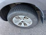 a close up of a car tire with a flat tire