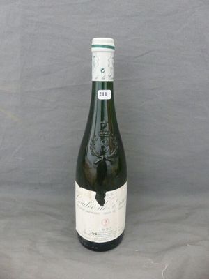 a bottle of wine that is sitting on a table