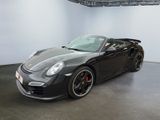 an image of a black sports car in a showroom